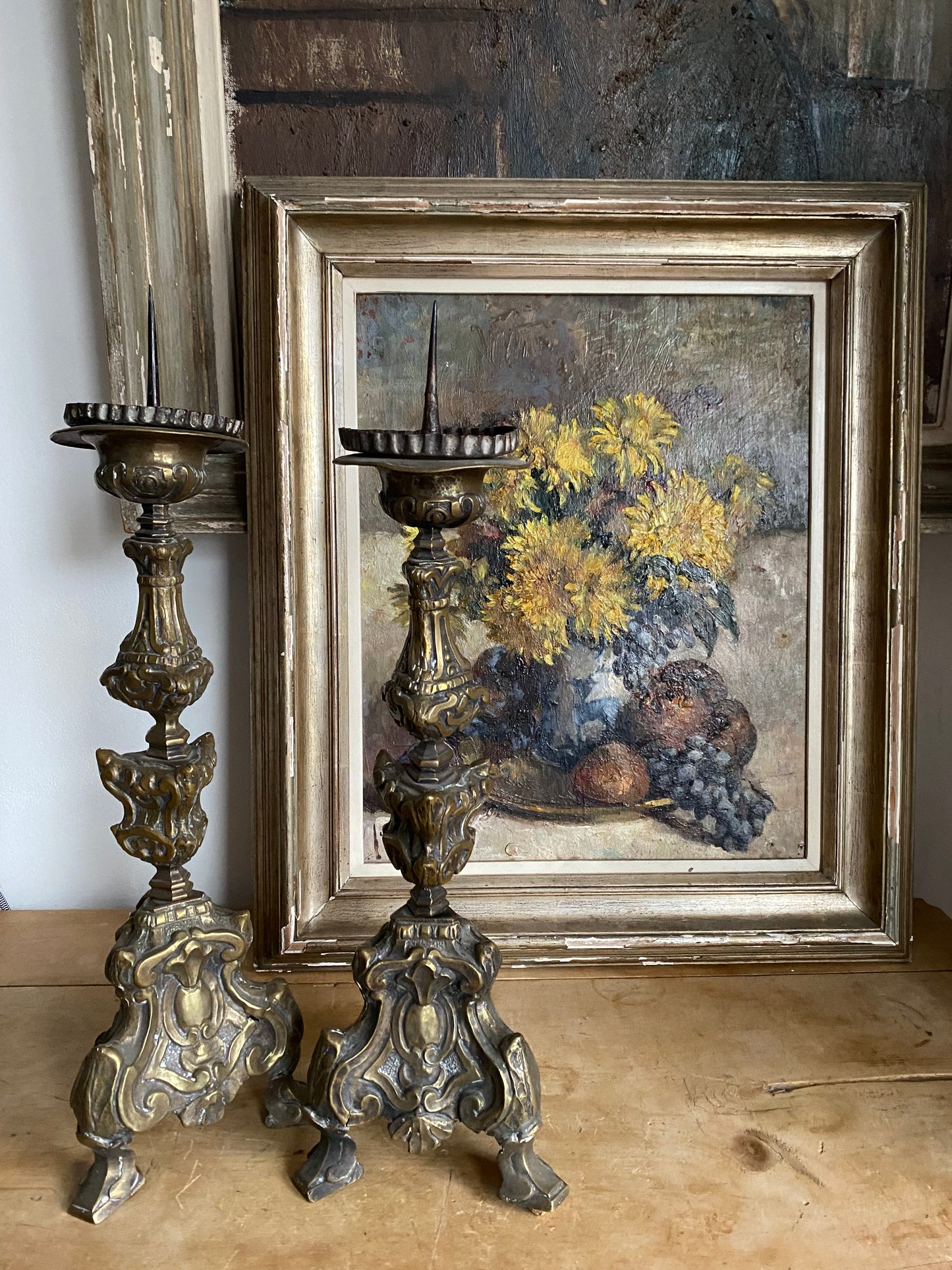 A Pair of Antique Decorative Copper Candlesticks